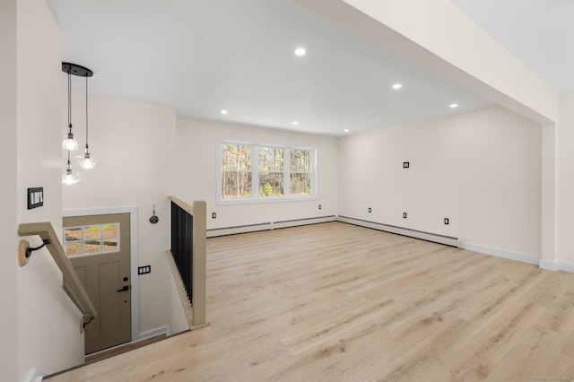 132 Bailey Pond Rd, Voluntown, CT 06384 - unfurnished living room with a baseboard heating unit, light wood-style flooring, recessed lighting, and baseboards