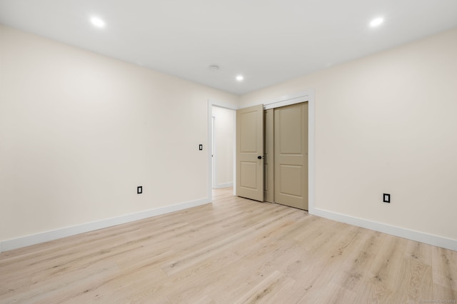 132 Bailey Pond Rd, Voluntown, CT 06384 - unfurnished bedroom featuring light wood-style flooring, recessed lighting, and baseboards