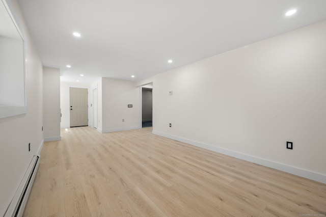 132 Bailey Pond Rd, Voluntown, CT 06384 - spare room featuring baseboard heating, light wood-style floors, recessed lighting, and baseboards