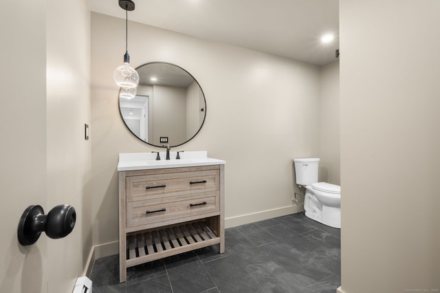 132 Bailey Pond Rd, Voluntown, CT 06384 - bathroom with toilet, vanity, and baseboards