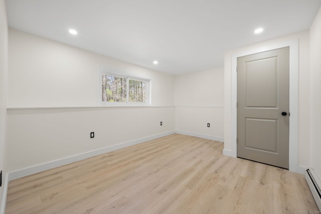 132 Bailey Pond Rd, Voluntown, CT 06384 - spare room featuring a baseboard radiator, wood finished floors, recessed lighting, and baseboards