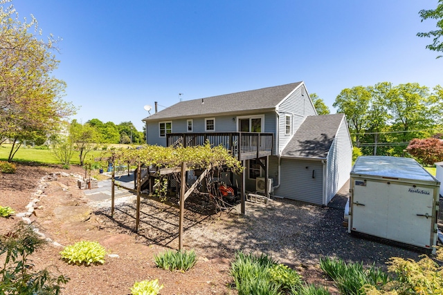 10 Spoonville Rd, East Granby, CT 06026 - rear view of property featuring a deck and a shingled roof