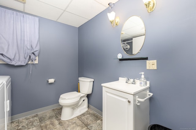 10 Spoonville Rd, East Granby, CT 06026 - full bath with washer and dryer, baseboards, toilet, a drop ceiling, and vanity