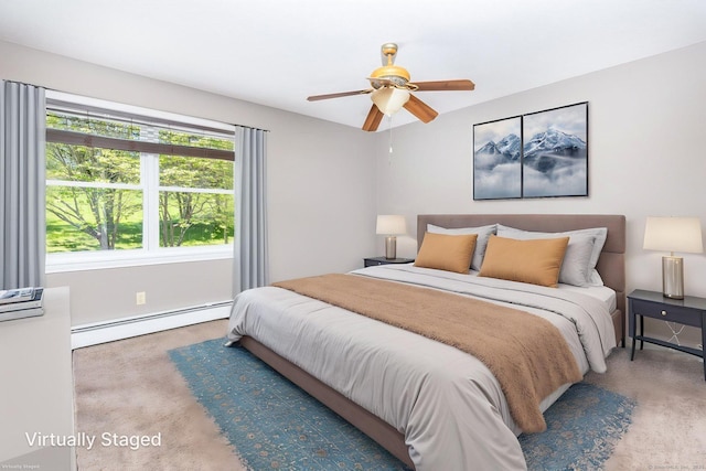 10 Spoonville Rd, East Granby, CT 06026 - bedroom with baseboard heating, carpet, a ceiling fan, and baseboards
