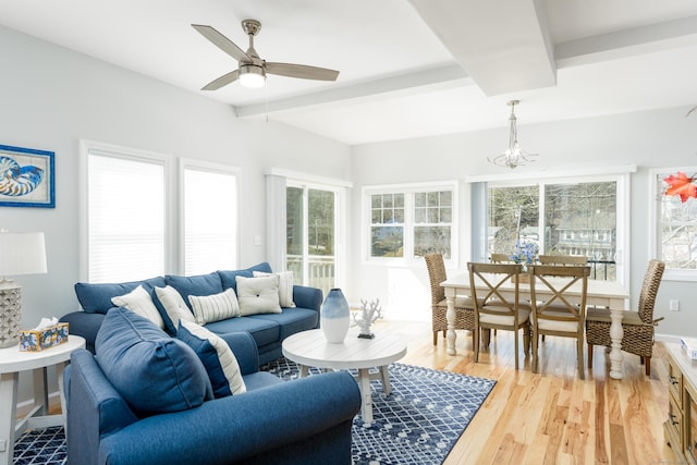 276 Niantic River Rd, Waterford, CT 06385 - living room featuring beam ceiling, light wood-style flooring, a ceiling fan, and a chandelier
