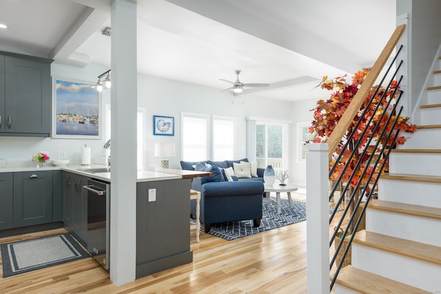 276 Niantic River Rd, Waterford, CT 06385 - kitchen featuring gray cabinetry, stainless steel dishwasher, light wood finished floors, light countertops, and a ceiling fan