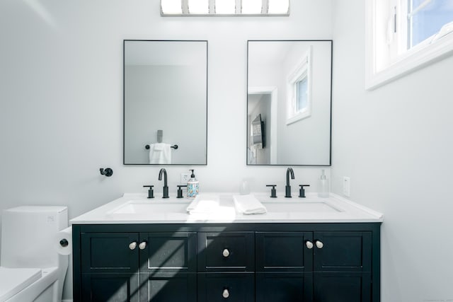 276 Niantic River Rd, Waterford, CT 06385 - bathroom featuring double vanity and toilet