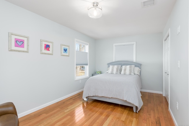 276 Niantic River Rd, Waterford, CT 06385 - bedroom with light wood-type flooring and baseboards