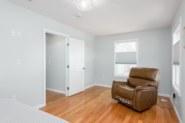 276 Niantic River Rd, Waterford, CT 06385 - sitting room with light wood-style flooring and healthy amount of natural light