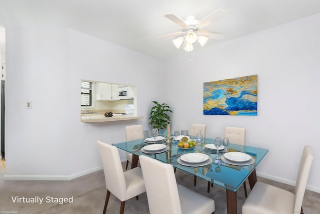 85 Metacomet Dr Unit 85, Meriden, CT 06450 - dining area featuring baseboards, a ceiling fan, and carpet