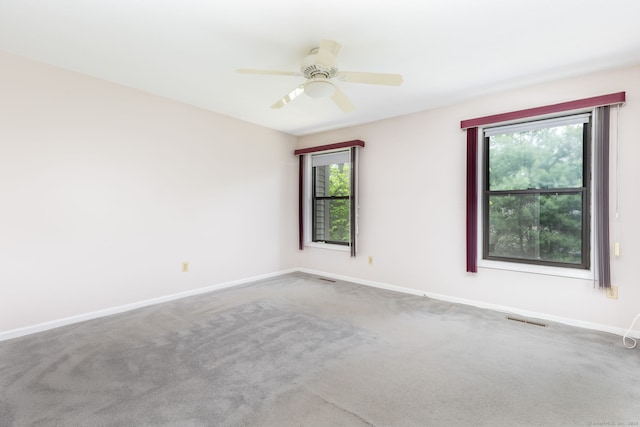 85 Metacomet Dr Unit 85, Meriden, CT 06450 - spare room featuring baseboards, carpet flooring, and ceiling fan