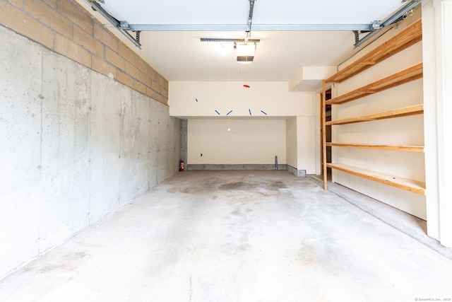 85 Metacomet Dr Unit 85, Meriden, CT 06450 - garage featuring a garage door opener