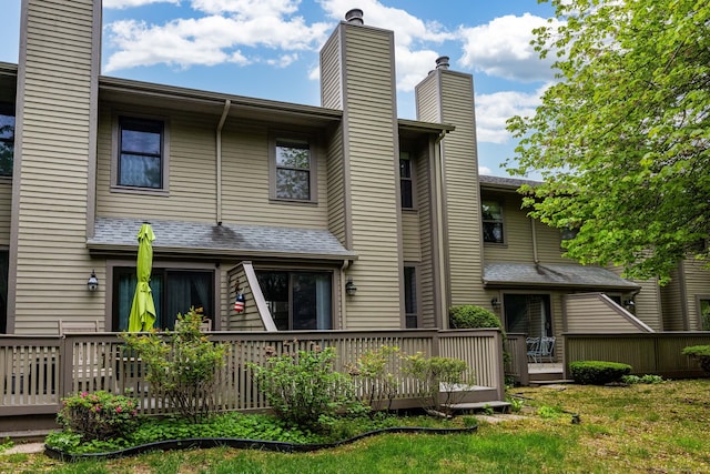 85 Metacomet Dr Unit 85, Meriden, CT 06450 - rear view of property with a chimney and a wooden deck