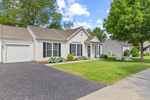 8 Cypress Way, Waterford, CT 06385 - view of front facade with an attached garage, a front yard, driveway, and roof with shingles