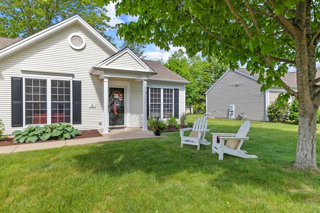 8 Cypress Way, Waterford, CT 06385 - view of front facade with a front yard and roof with shingles