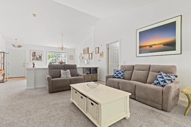 8 Cypress Way, Waterford, CT 06385 - living area with a chandelier, vaulted ceiling, light carpet, and baseboards