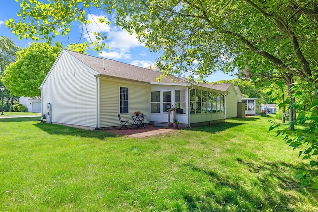 8 Cypress Way, Waterford, CT 06385 - rear view of house featuring a sunroom, a yard, and a patio