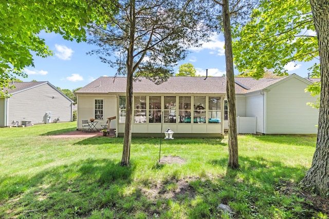8 Cypress Way, Waterford, CT 06385 - back of house featuring a sunroom, a yard, and roof with shingles