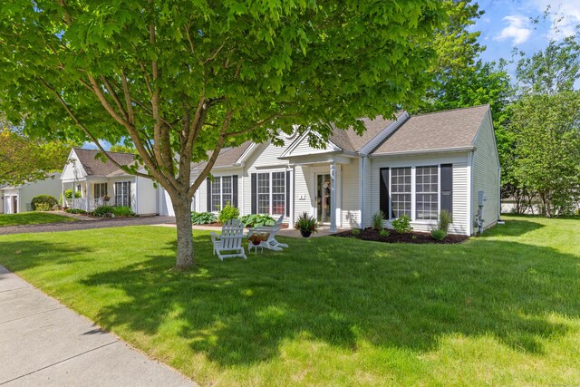 8 Cypress Way, Waterford, CT 06385 - view of front of house with a front lawn and a shingled roof