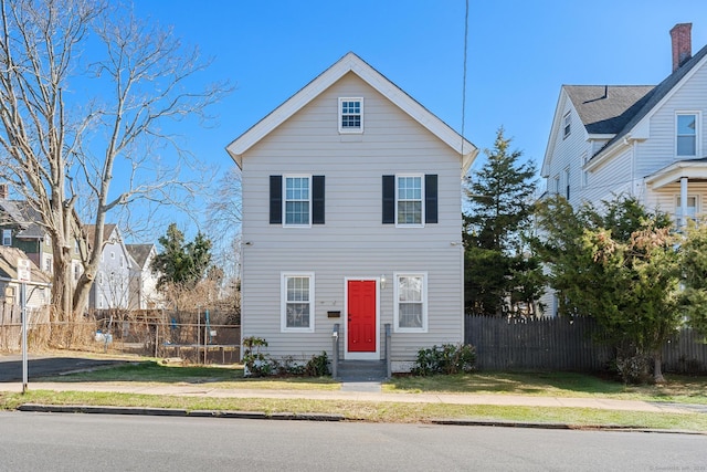 69 Trinity St, New Britain, CT 06051 - traditional-style home featuring fence