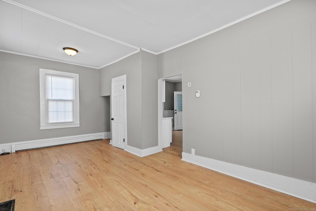 69 Trinity St, New Britain, CT 06051 - unfurnished room featuring ornamental molding, wood finished floors, a baseboard radiator, and baseboards