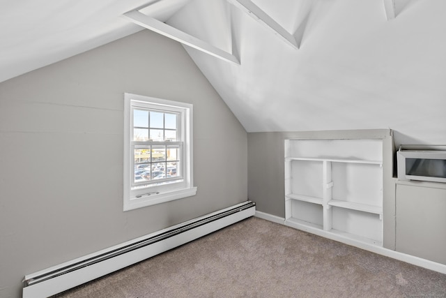 69 Trinity St, New Britain, CT 06051 - bonus room with a baseboard heating unit, carpet floors, lofted ceiling, and built in shelves