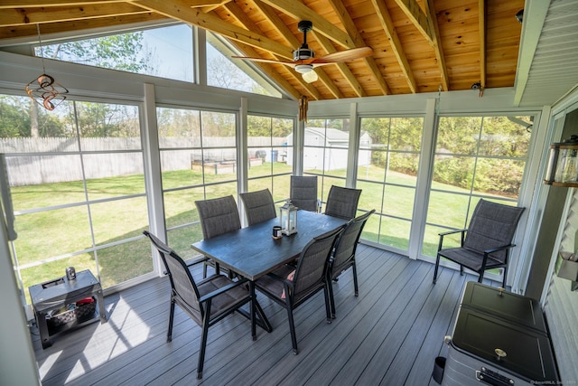 sunroom with outdoor dining space and ceiling fan