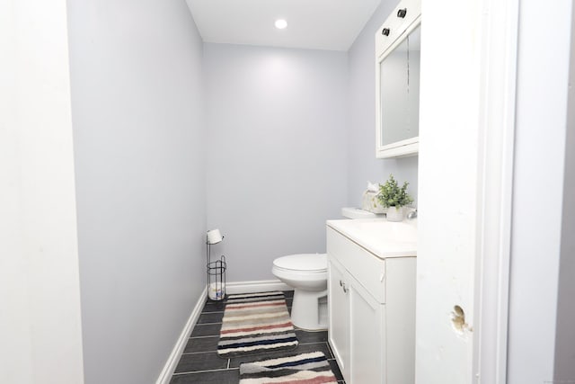 2 Apple Hill Rd, Wolcott, CT 06716 - half bath featuring baseboards, toilet, vanity, and recessed lighting
