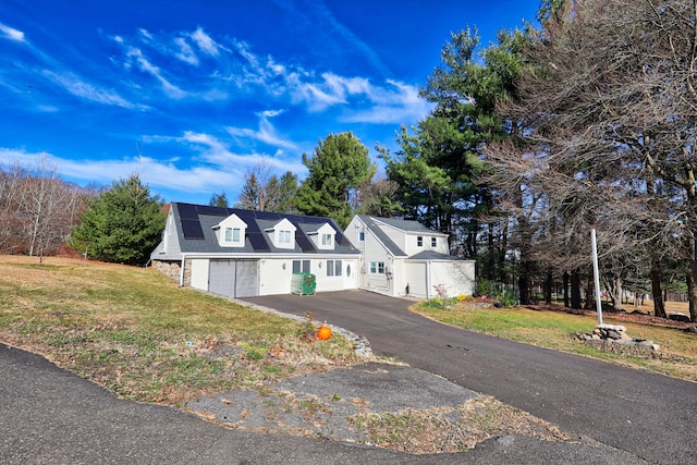 2 Apple Hill Rd, Wolcott, CT 06716 - cape cod house with a garage, asphalt driveway, and a front yard