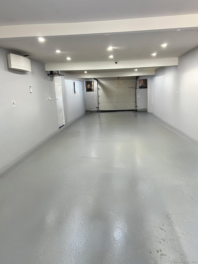 2 Apple Hill Rd, Wolcott, CT 06716 - garage with a wall mounted AC and recessed lighting