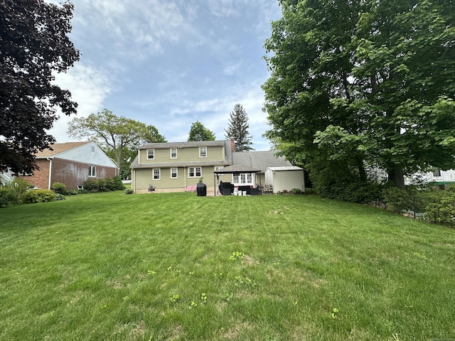 260 W Center St, Southington, CT 06489 - rear view of property with a lawn