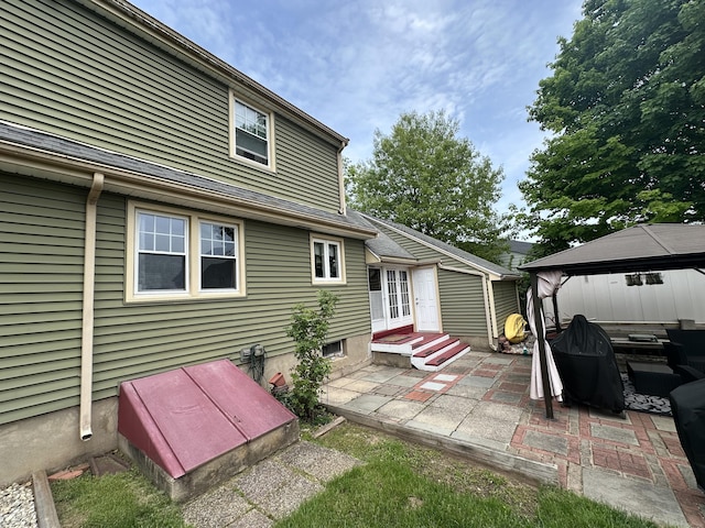 260 W Center St, Southington, CT 06489 - rear view of property with a gazebo and a patio area