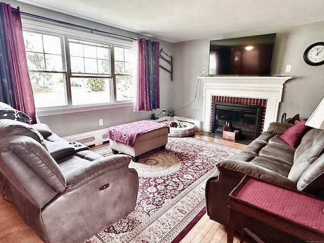 260 W Center St, Southington, CT 06489 - living area with wood finished floors and a fireplace