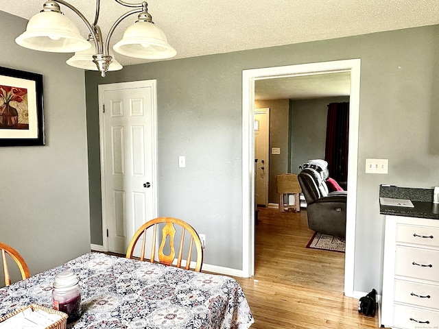260 W Center St, Southington, CT 06489 - dining room with light wood finished floors and baseboards
