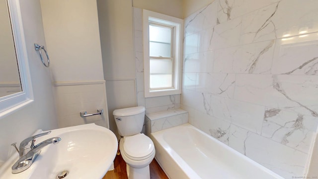 full bath with a sink and toilet