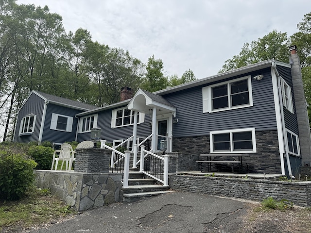 1731 Marion Rd, Cheshire, CT 06410 - view of front of property with a chimney and stone siding