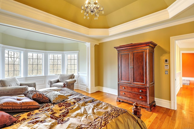 84 Mustang Dr, Monroe, CT 06468 - bedroom featuring a chandelier, light wood-type flooring, decorative columns, and crown molding