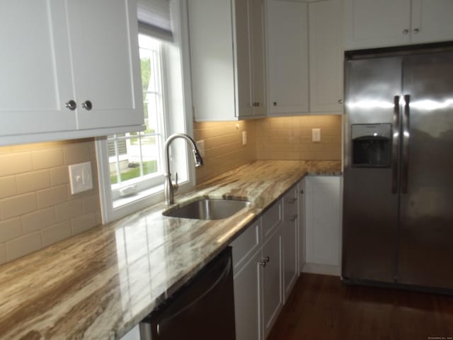 94 Stonehouse Rd Unit 16, Coventry, CT 06238 - kitchen with stainless steel fridge with ice dispenser, a sink, black dishwasher, and healthy amount of natural light