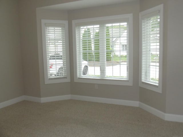 94 Stonehouse Rd Unit 16, Coventry, CT 06238 - carpeted empty room featuring baseboards