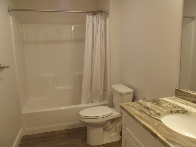 94 Stonehouse Rd Unit 16, Coventry, CT 06238 - bathroom featuring wood finished floors, toilet, shower / bath combo, and vanity