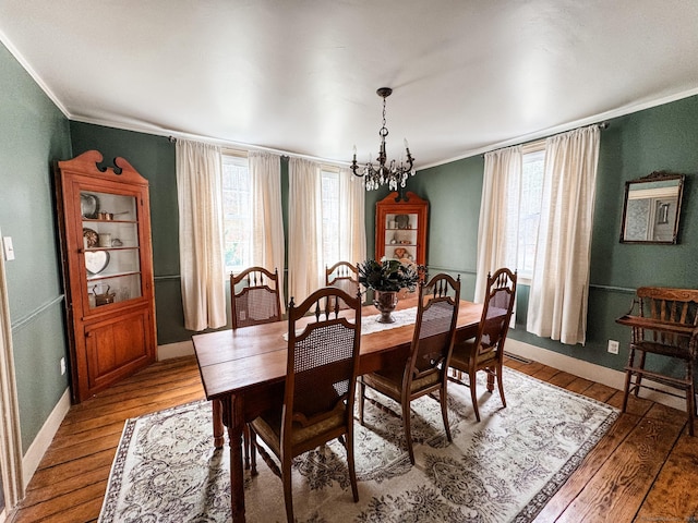 49 Bennett Pond Rd, Canterbury, CT 06331 - dining space featuring ornamental molding, a chandelier, light wood-style floors, and baseboards