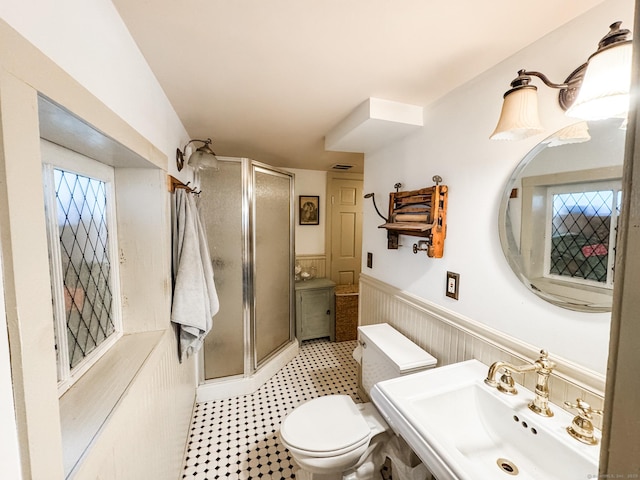 49 Bennett Pond Rd, Canterbury, CT 06331 - full bath featuring a sink, wainscoting, a stall shower, toilet, and plenty of natural light