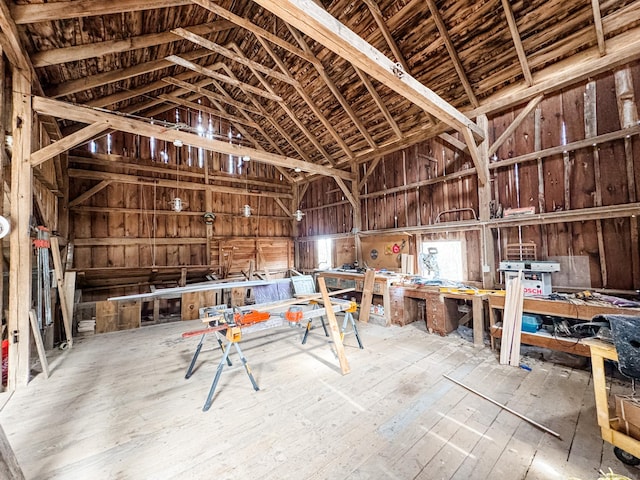 49 Bennett Pond Rd, Canterbury, CT 06331 - miscellaneous room with a workshop area, vaulted ceiling, and hardwood / wood-style floors