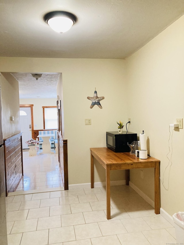 67 S Beechwood Rd, East Lyme, CT 06357 - office area featuring baseboards and light tile patterned floors