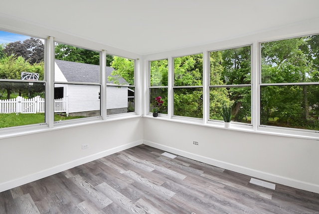 145 Westminster St, Hamden, CT 06518 - unfurnished sunroom with baseboards and wood finished floors