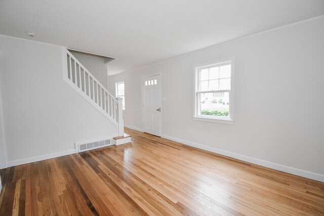 145 Westminster St, Hamden, CT 06518 - foyer entrance with stairs, hardwood / wood-style floors, ornamental molding, and baseboards