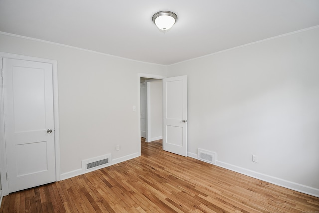 145 Westminster St, Hamden, CT 06518 - empty room featuring hardwood / wood-style flooring, baseboards, and ornamental molding