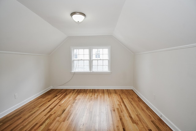 145 Westminster St, Hamden, CT 06518 - additional living space with light wood finished floors, baseboards, and vaulted ceiling
