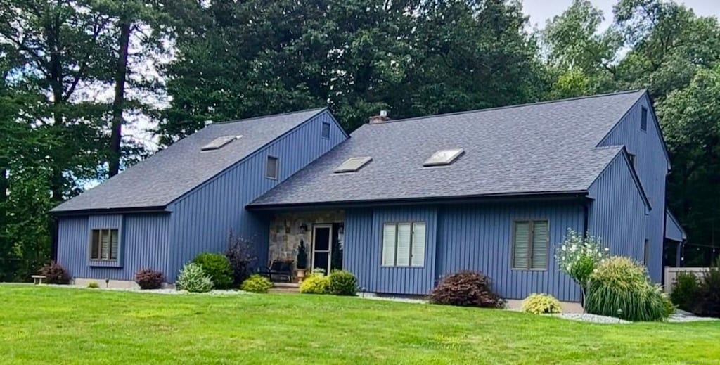66 Amato Cir, Southington, CT 06489 - view of front of home with a front lawn and roof with shingles