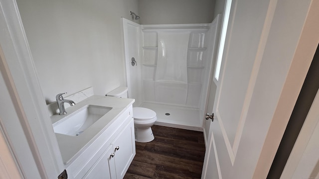 40 Yorktown Rdg, Waterbury, CT 06704 - full bath with a stall shower, toilet, wood finished floors, and vanity